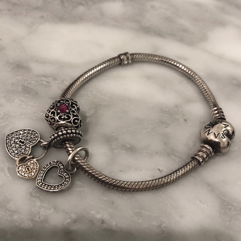 Pandora bracelet with 3 charms (included)